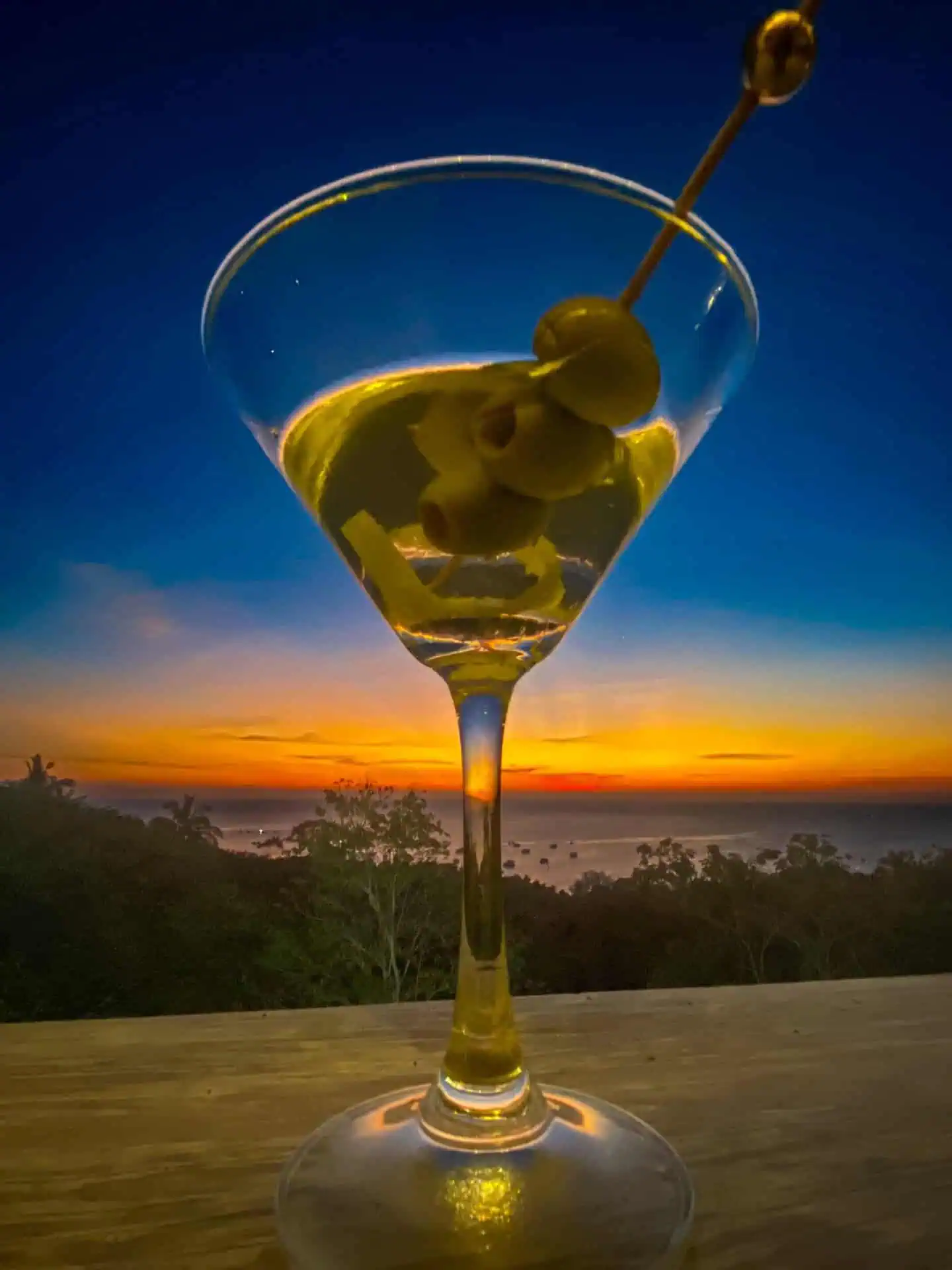 Martini cocktail with sunset views at The Gold Bar Koh Tao
